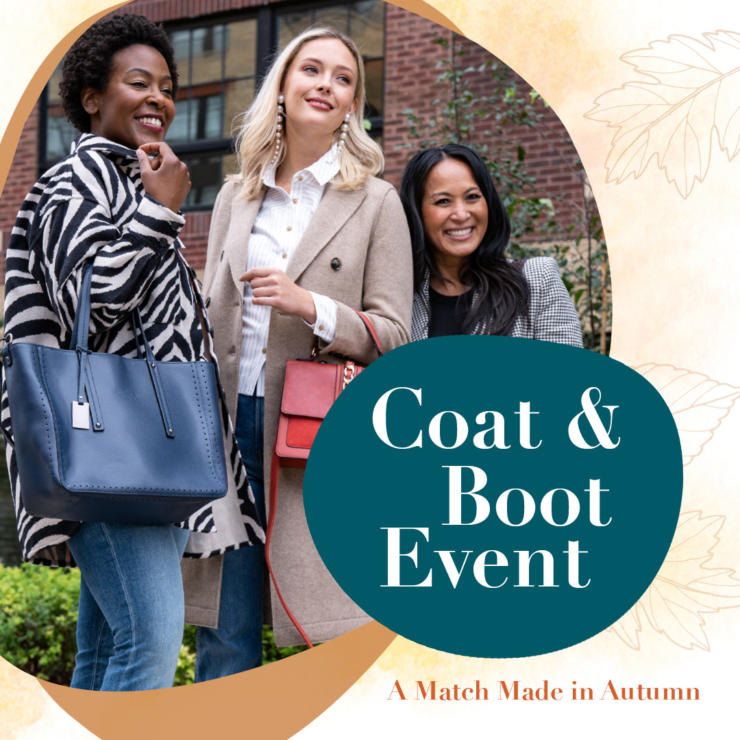 An image of three women who are smiling wearing winter coats and big handbags